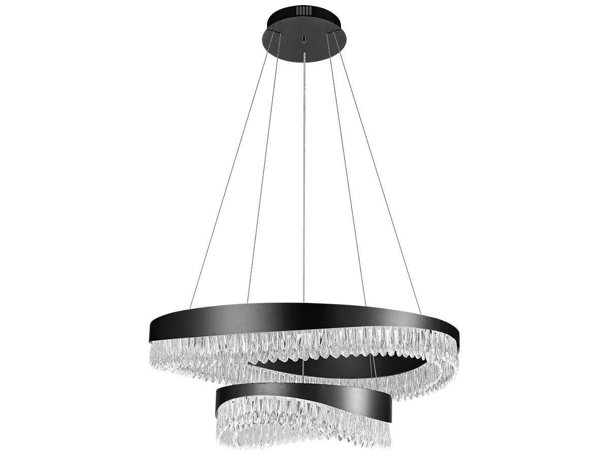 Il contrasto tra la superficie scura e i dettagli in cristallo crea un effetto luminoso distintivo in un interno moderno.